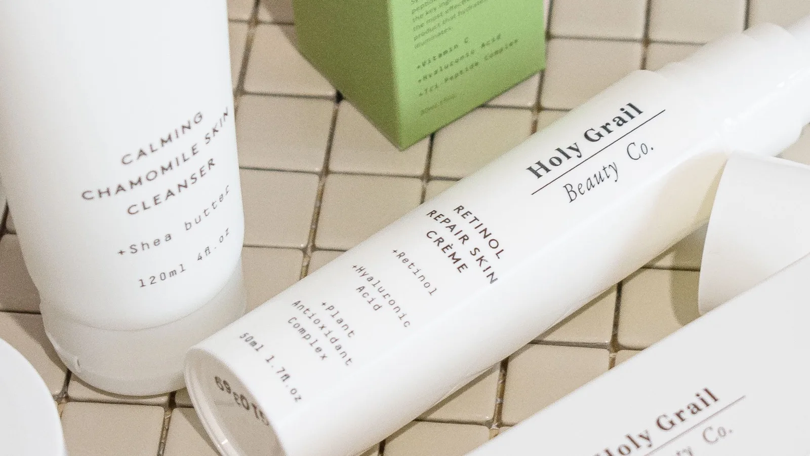 Skincare products arranged for comparing retinol alternatives.